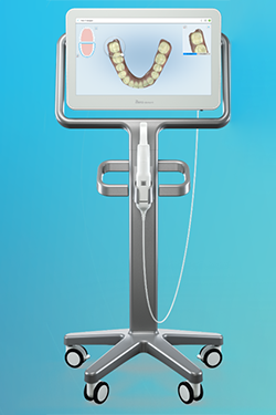 Dr. Maron showing a patient a digital x-ray of her root canal