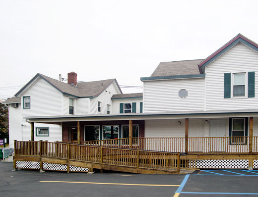 Dr. Maron's dental office with its handicap-accessible entrance and parking lot 